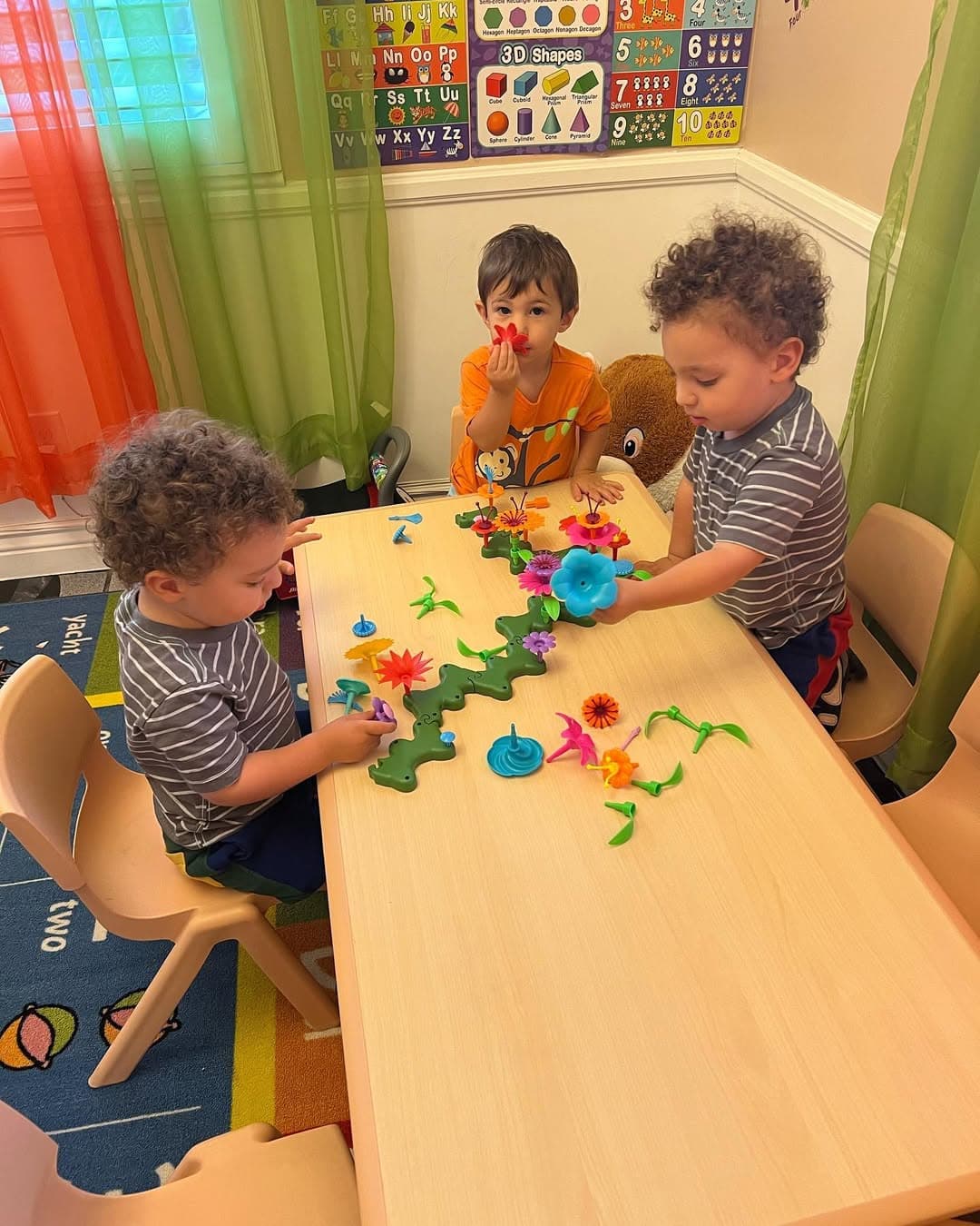 Children building with colorful flower blocks